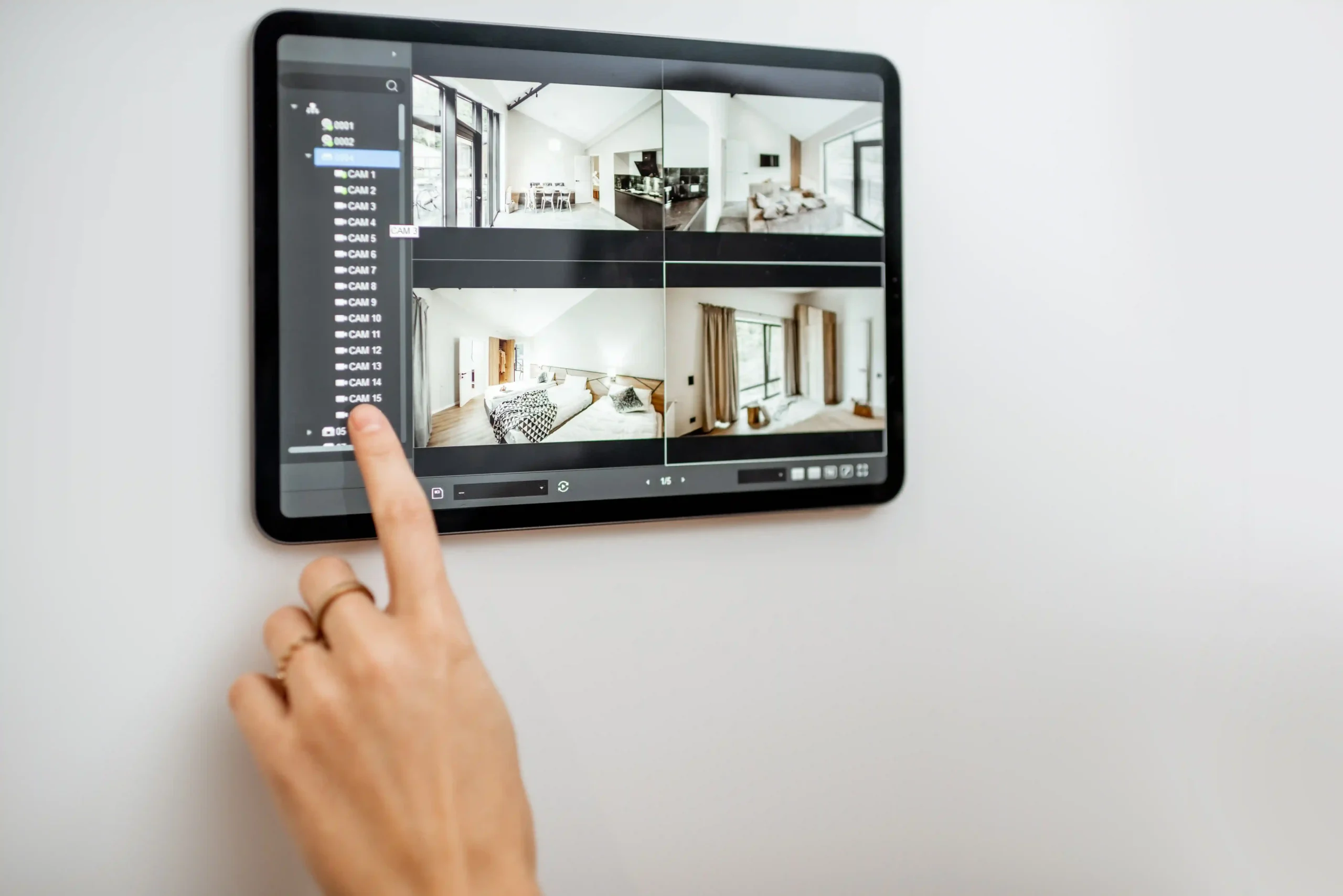 User navigating camera feed on tablet display